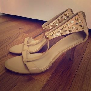 Like New! Strappy nude sandals with gold accents.